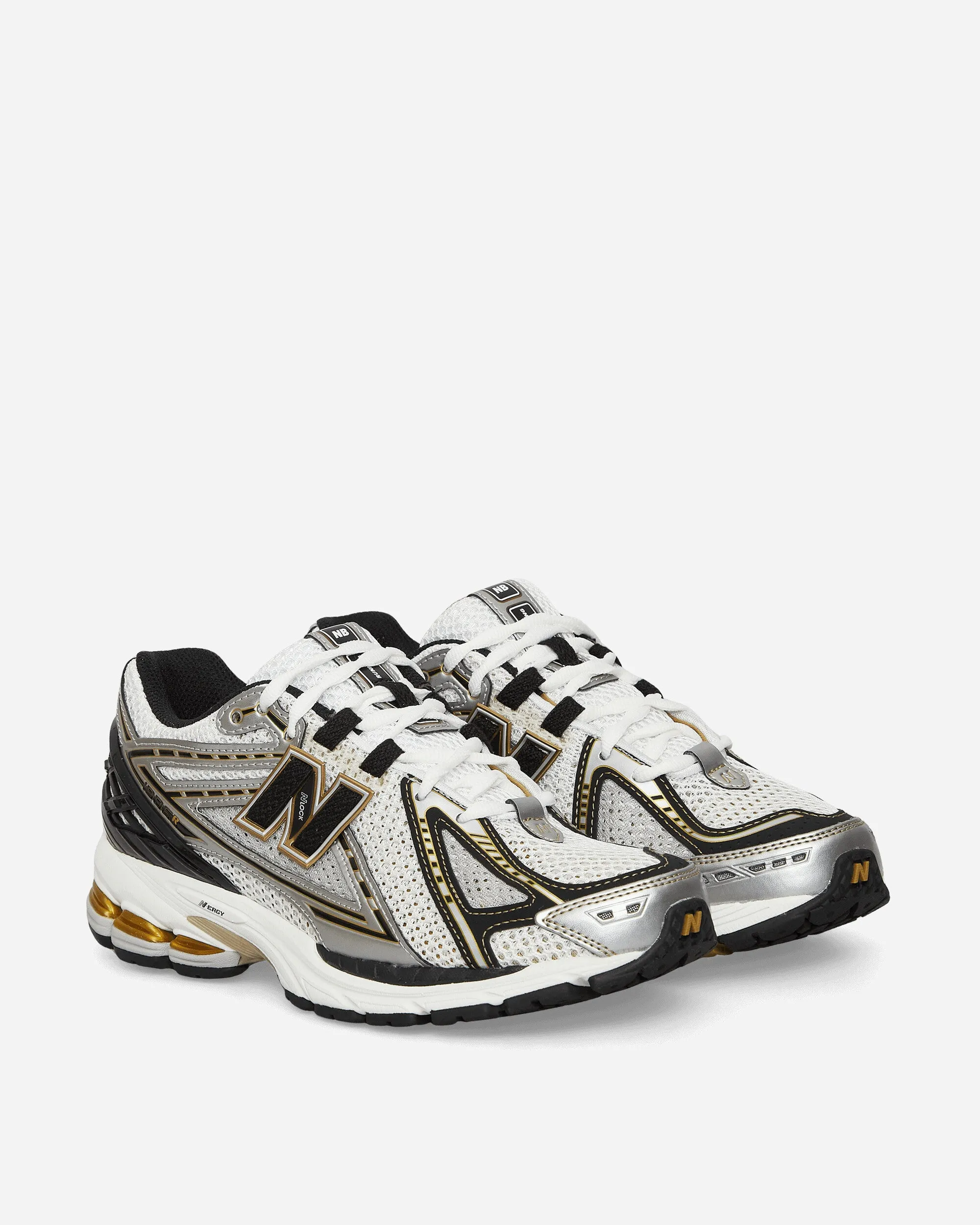 1906R Sneakers Silber Metallic / Vintage Gold / Schwarz