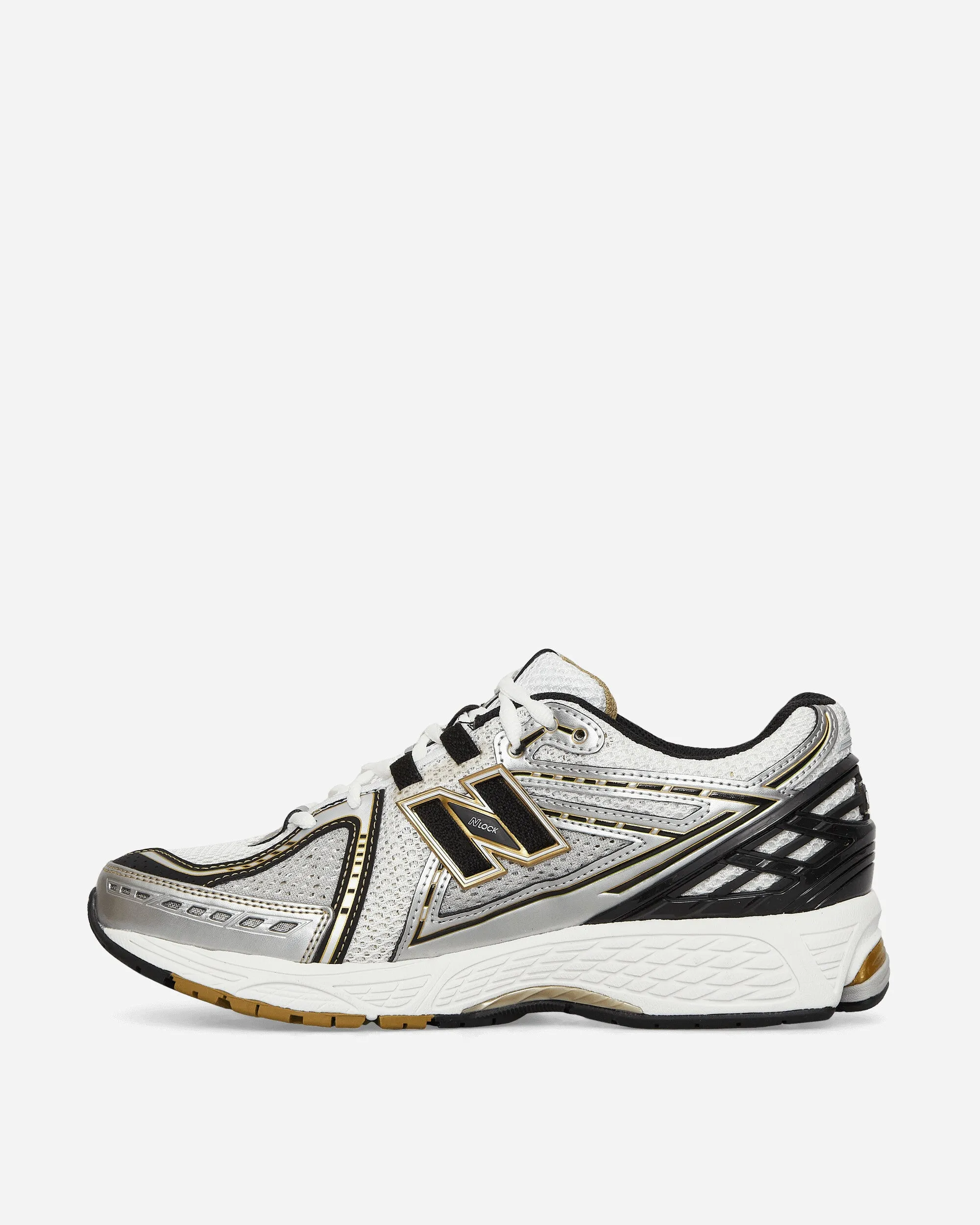 1906R Sneakers Silber Metallic / Vintage Gold / Schwarz
